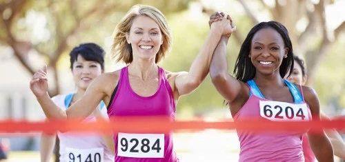 Women Finishing Marathon High Five