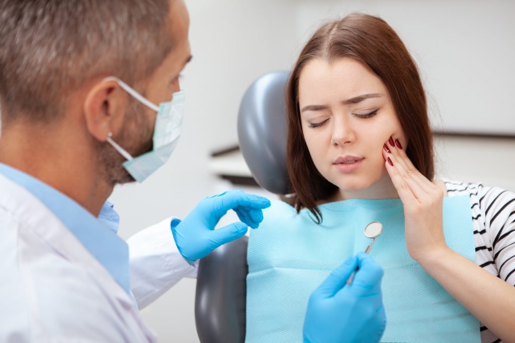 woman in tooth pain