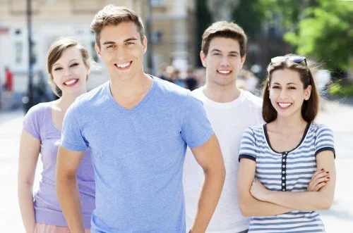 group of young people with straight smiles